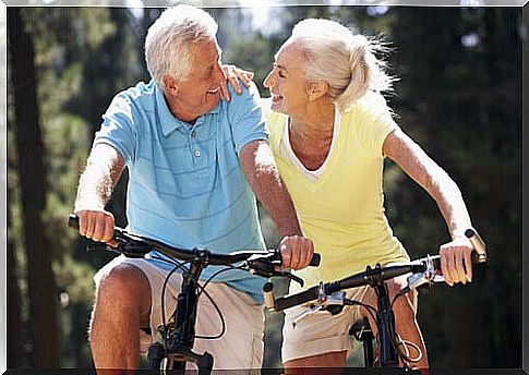 Elderly couple on a bicycle