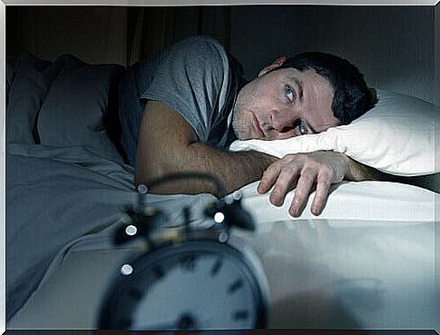 man suffering from insomnia