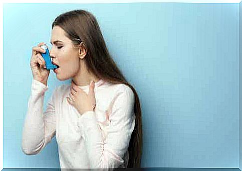 Woman with an inhaler.