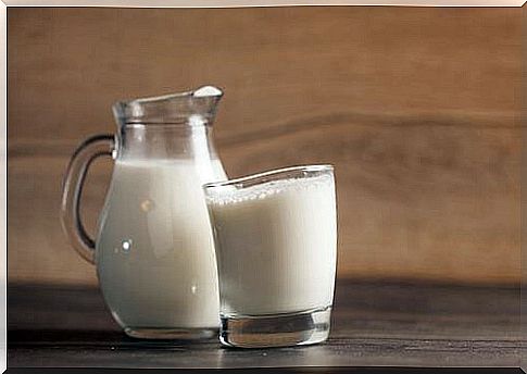 a glass of milk with milk for cleansing plant leaves