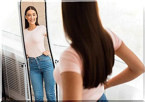 Woman in front of the mirror