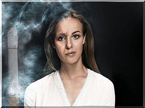 Woman in cigarette smoke fumes