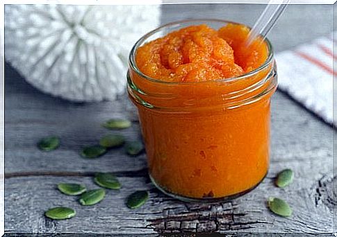 A jar of grated carrots.