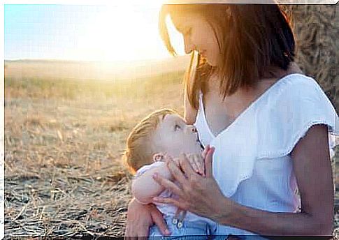 Watering the baby in the summer